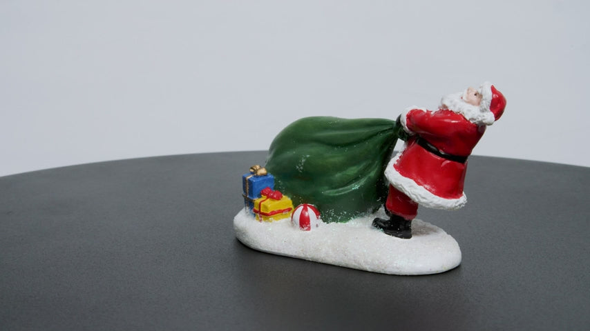 Santa Pulling Toy Bag